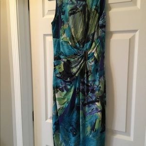 Knee Length , rousing front,  V back